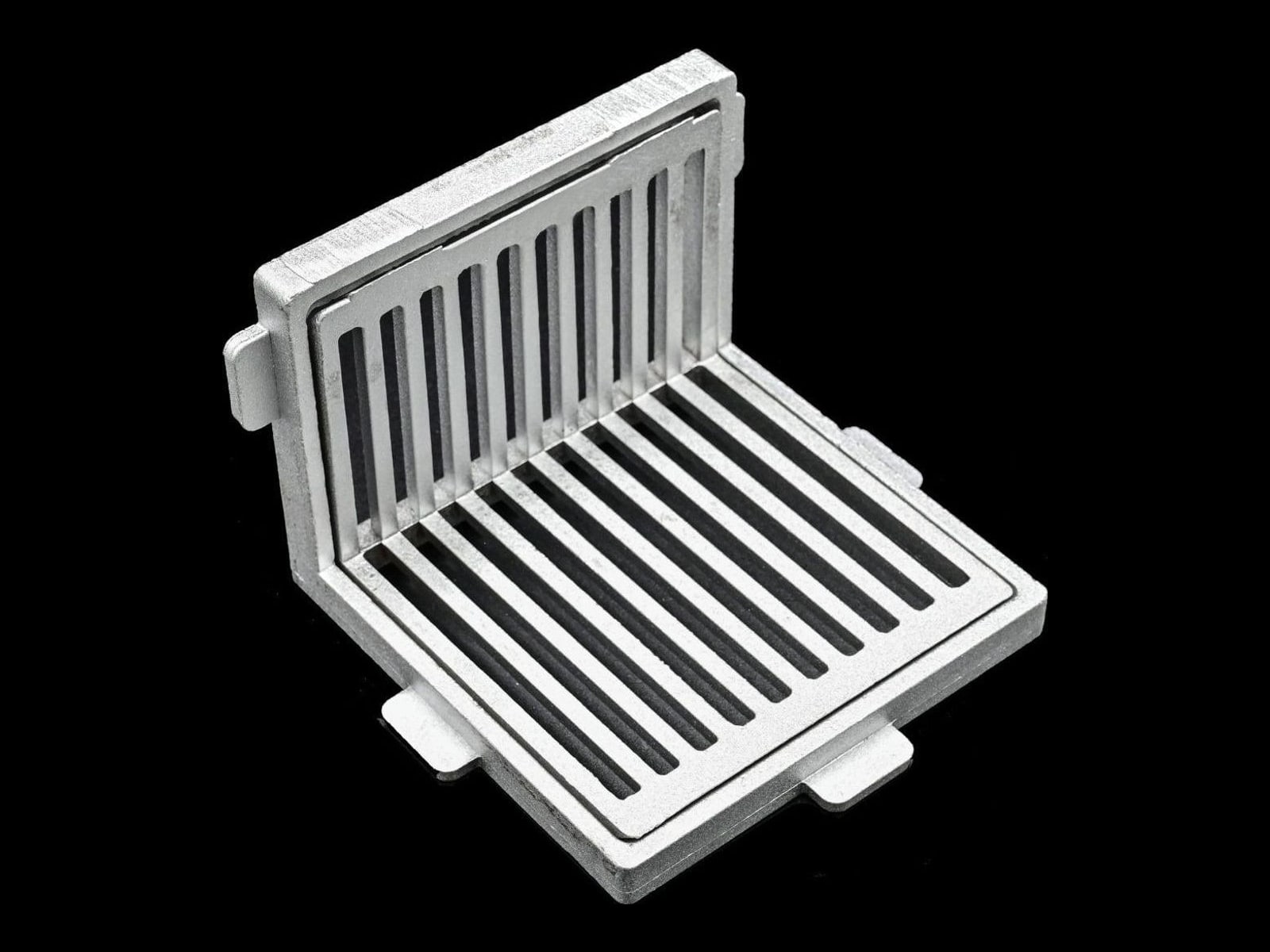 Chiusino a feritoie parallele in alluminio pressofuso